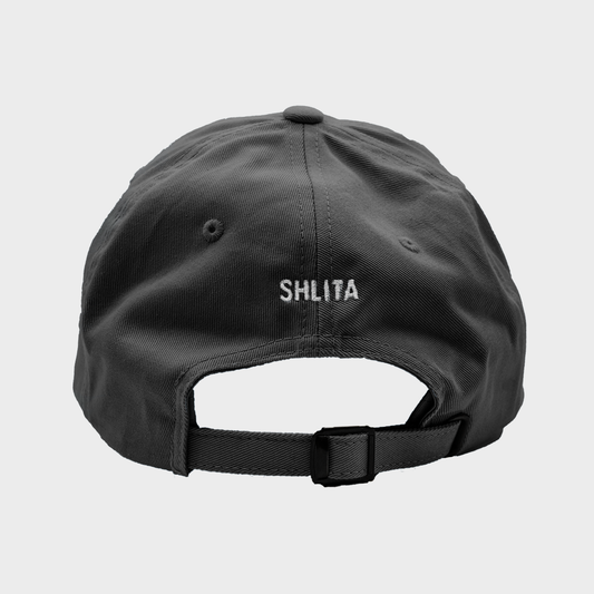 Black cap with 'SHLITA' branding on a light gray background